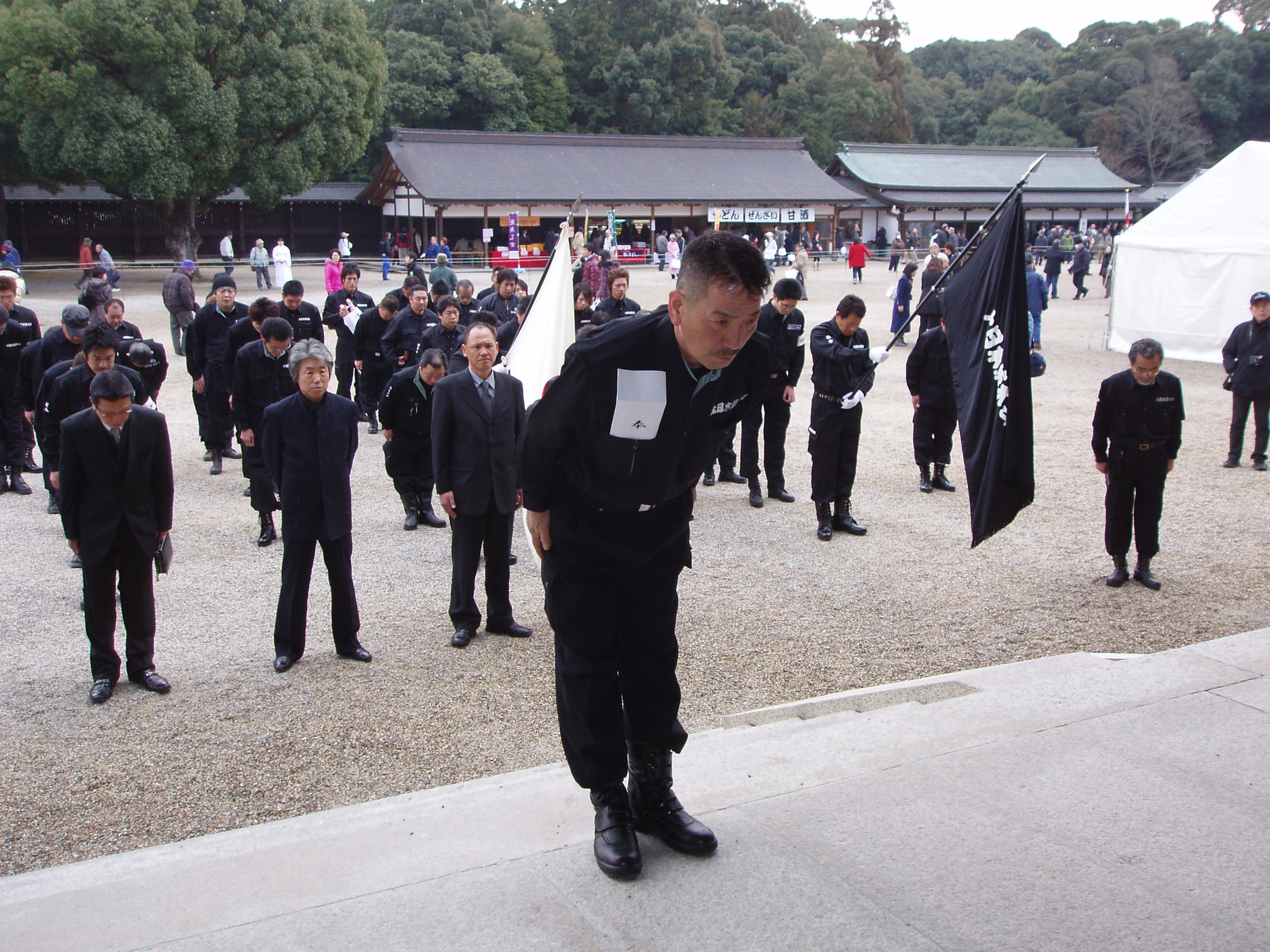 Under prime minister Abe Shinzo, nationalist groups have been emboldened, such as this paramilitary group worshipping legendary first emperor, Jimmu, at Kashihara Jingu.