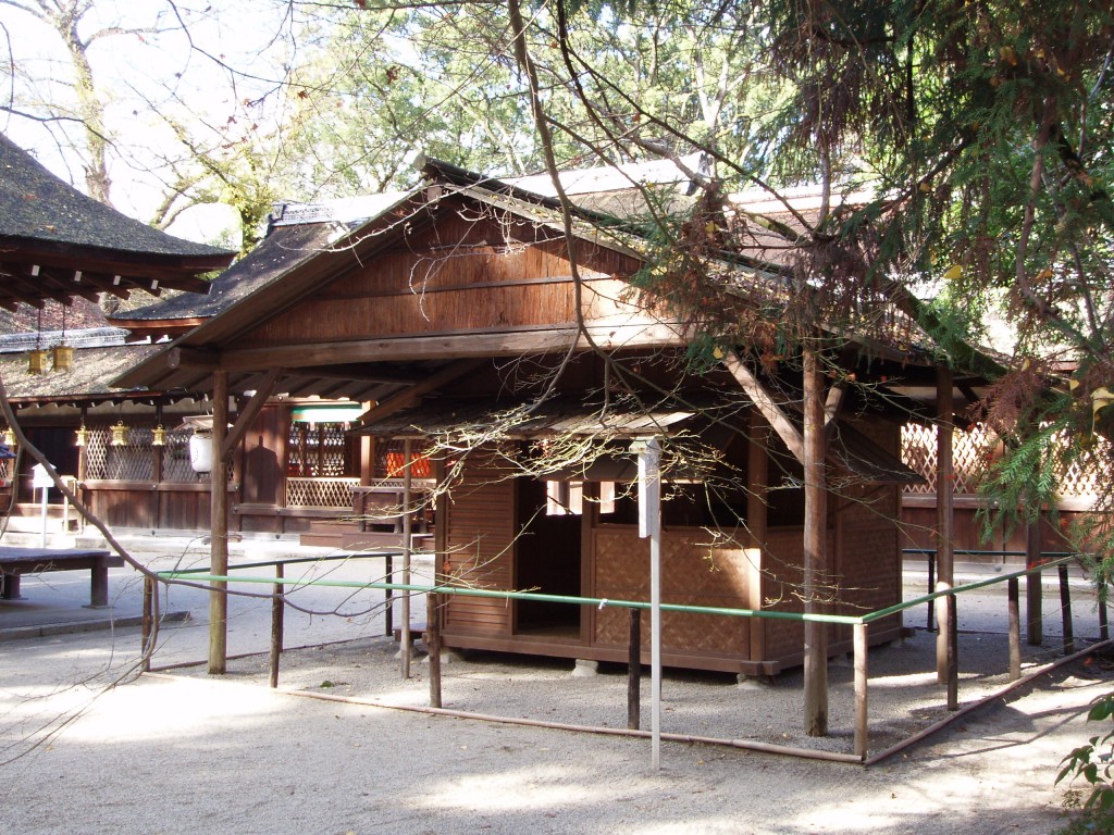 Model of Kamo no Chomei's hut, housed at Kawai Jinja within Shimogamo Shrine.  The hut itself is beneath the large protective roof.