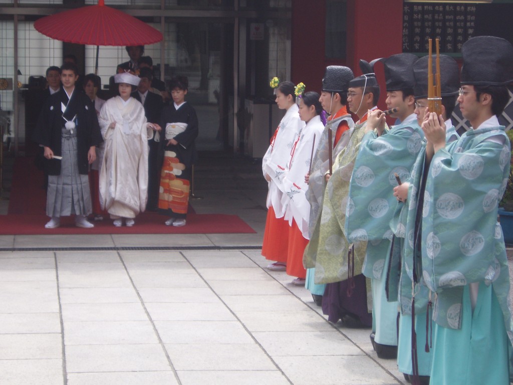 Gagaku musicians lined up to accompany the newly-wed's procession