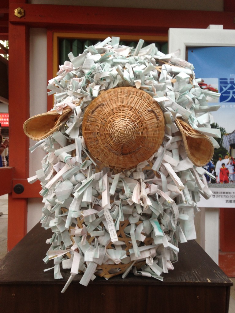 Afterwards the omikuji were tied up in an arrangement that with a bit of imagination can be seen to be a sheep.