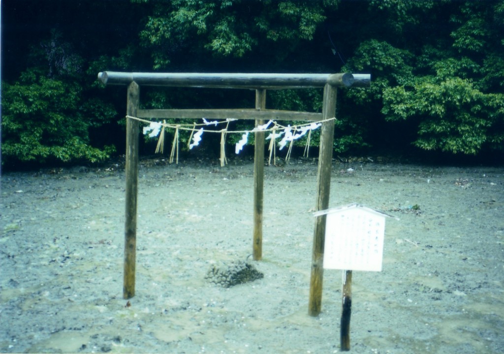 The three-legged torii at Watatsumi Shrine in Tsushima, close to the Korean peninsula.  The notice says that this is how the structure is thought to have looked originally.  