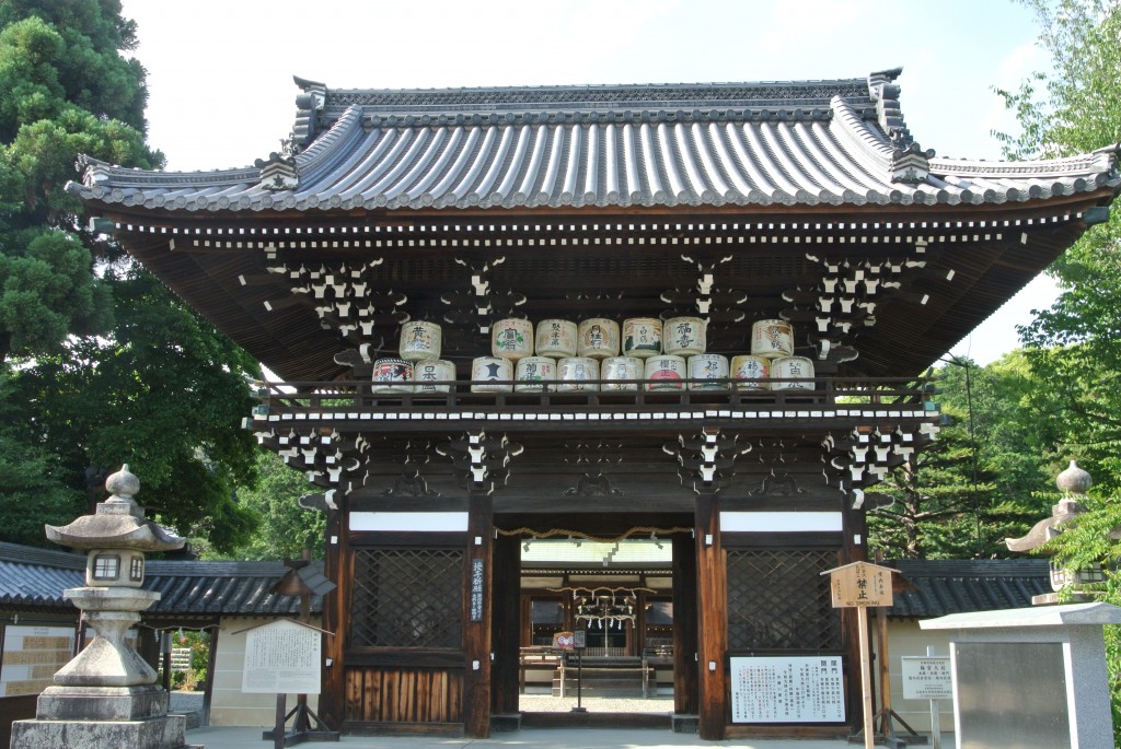 The entrance gate to the shrine, with saké barrels.  The shrine has strong saké connections.