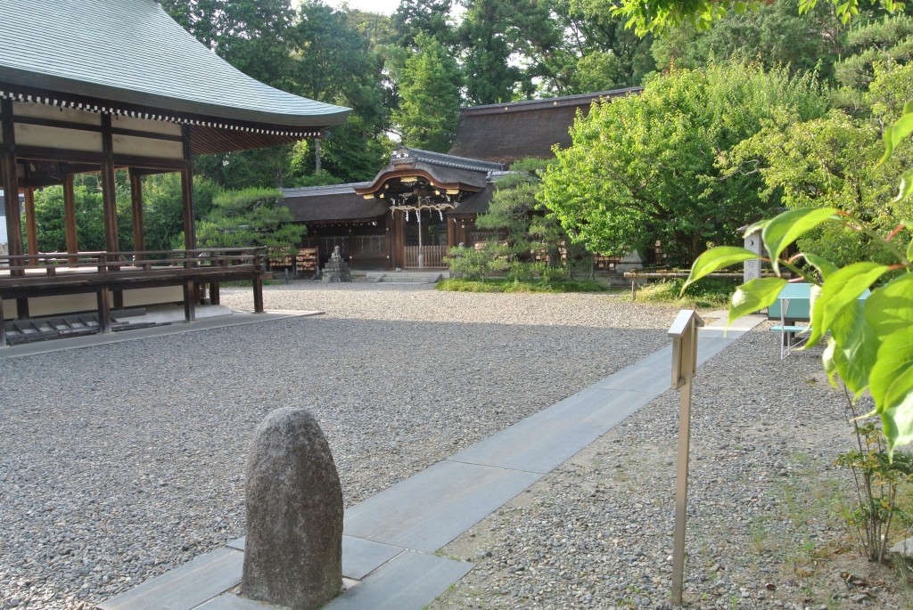 The main compound with the Hyakudo mairi (One hundred times) markers in the foreground.  Devotees walk between the two rocks 100 times with a deep wish in their hearts, paying respects to the kami at the start and end at the Worship Hall.