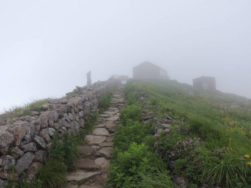 Gassan Shrine peeks through a thick mountain fog. | Photo by DAVEY YOUNG