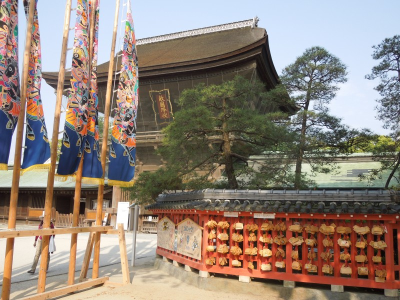 The entrance to Hakozaki Shrine in Fukuoka, where freak shows include biting the heads off snakes