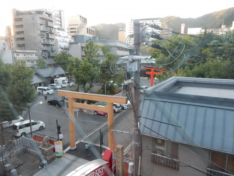 Ikuta Shrine seen from its surrounds hardly seems a centre of nature worship