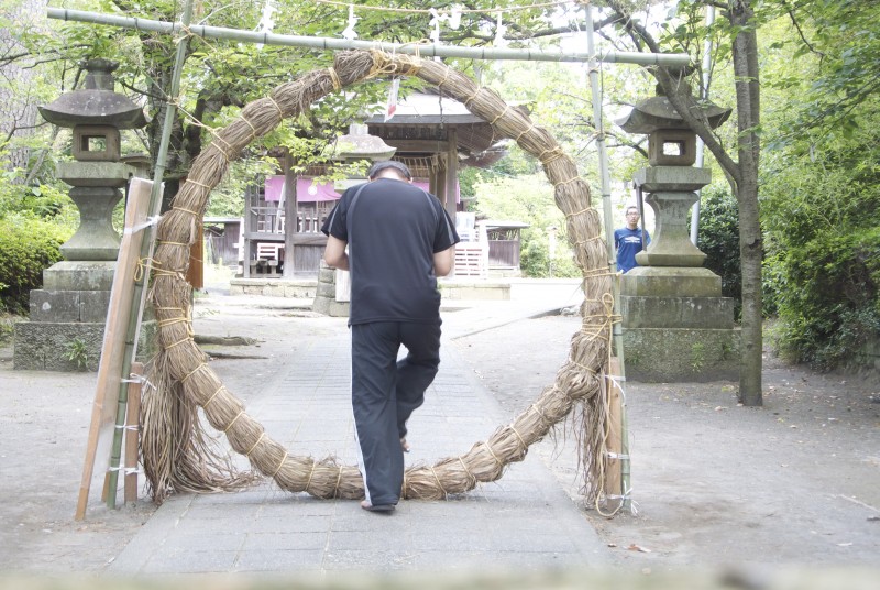 Stepping through the straw circle is a form of rebirth, whether in terms of a new purified self or into the life beyond