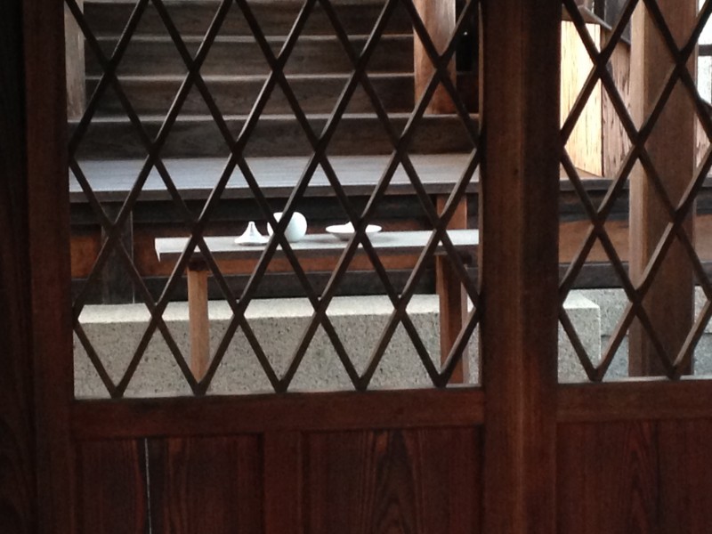 Offerings of sake and salt at a shrine