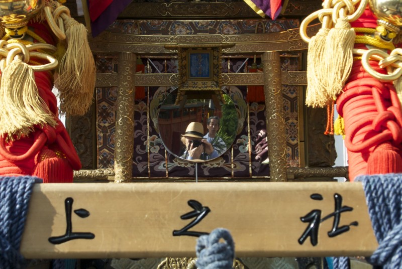 Mikoshi in Shinto festivals have mirrors on their side as a form of protection