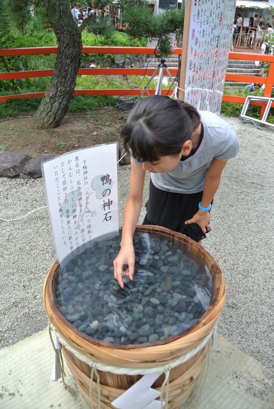 Sacred river stones that protect children against the supposed blight of 'kan-mushi'