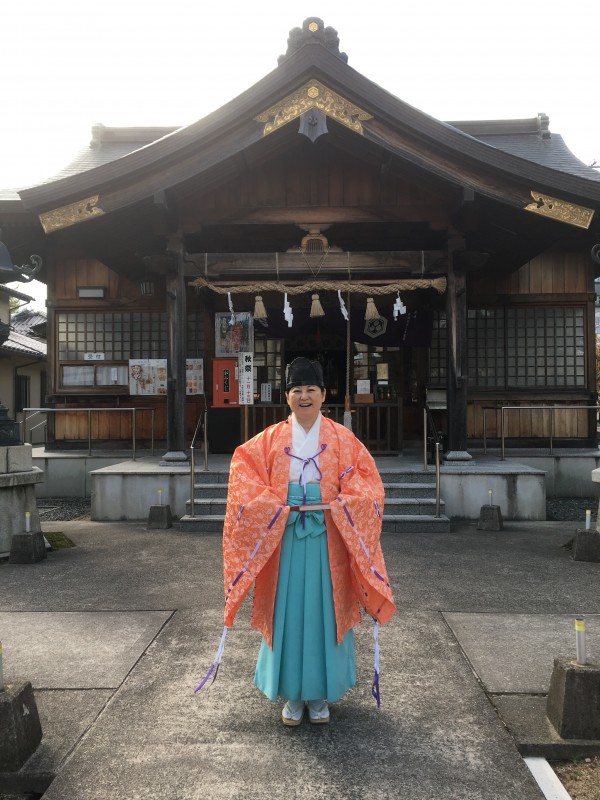 Izumi Hasegawa in front of the Shusse Inari Shrine in the Izumo regiion